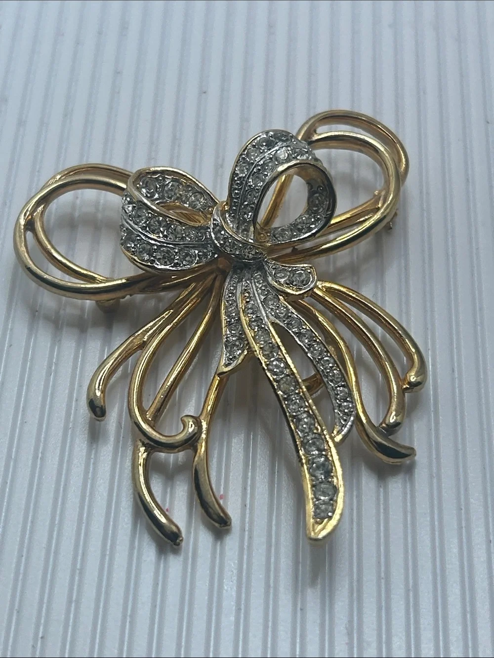Gold and Silver Ribbon Bow Brooch with Crystals